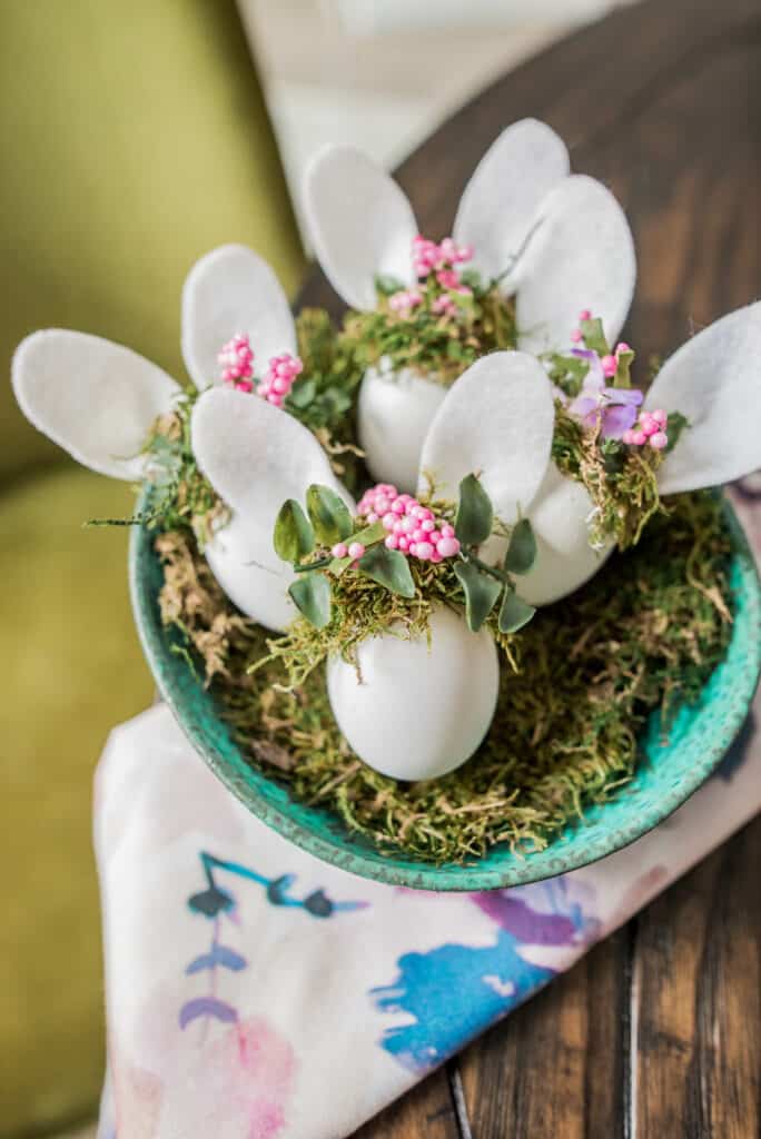 Easter bunny eggs with tiny floral crowns