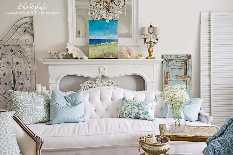 five minute styling tips - coastal colors accent a white room with rustic and vintage artwork