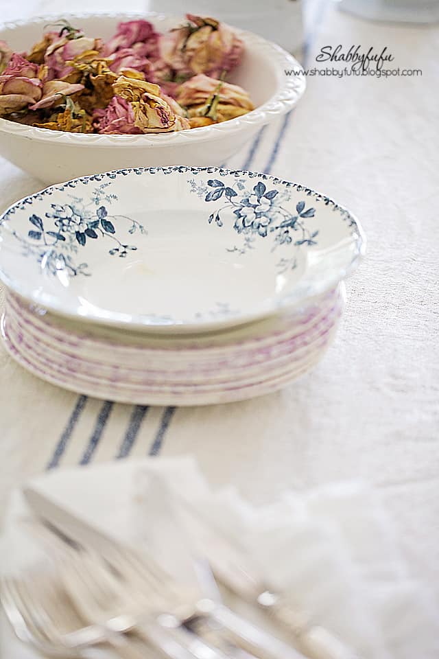 Dried rose petals and soft patterned china add an elegant charm to any fall vignettes.
