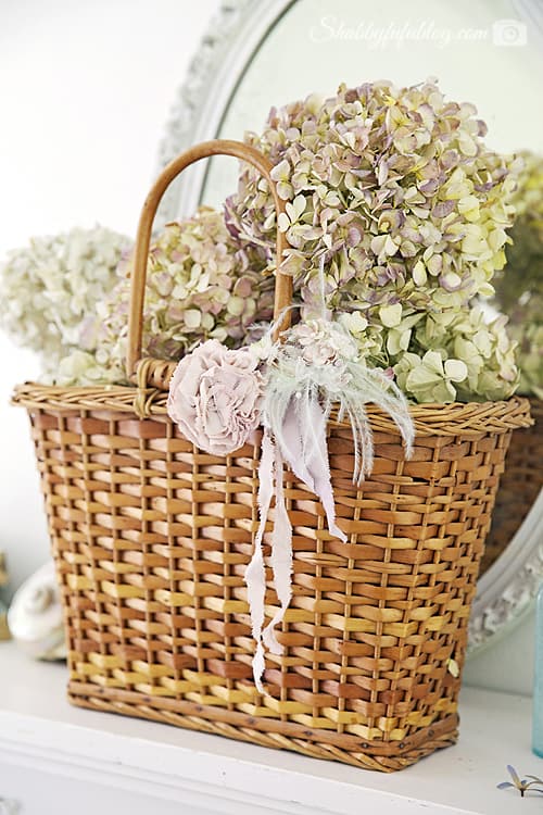 This vintage wicker basket with Peonies and ribbon makes for the cutest floral peony wreath.