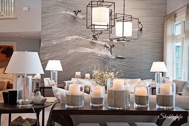 Details in the living room of the HGTV Dream Home 2016. This full-wall vintage black-and-white photo of a surfer is the biggest statement piece in the room and grabs your attention.