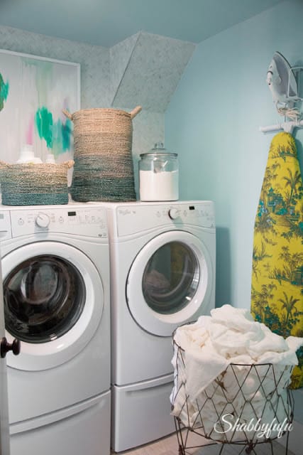 Mint green paint is carried over into the laundry room in the HGTV Dream Home 2016.