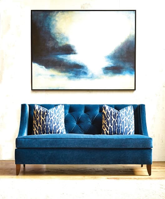 blue velvet tufted sofa