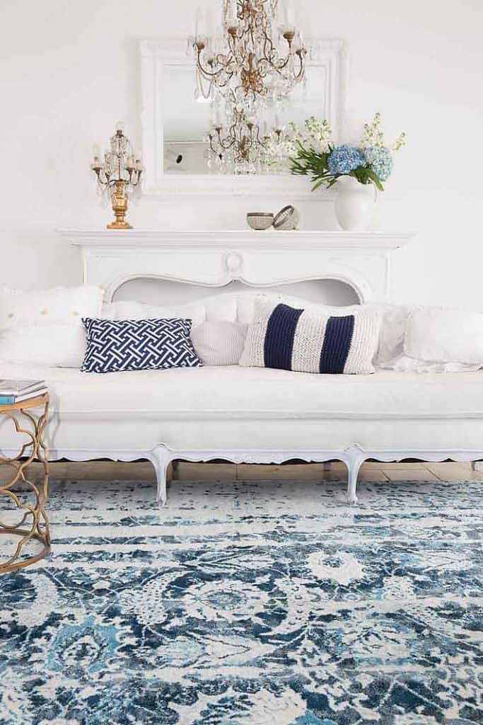 modern vintage living room in navy and white