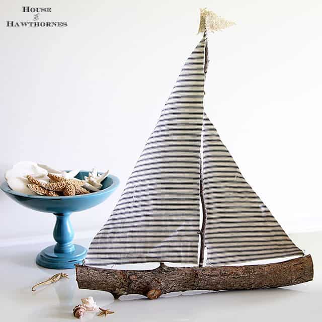 Creative Ways To Decorate With Shells diy sailboat with ticking