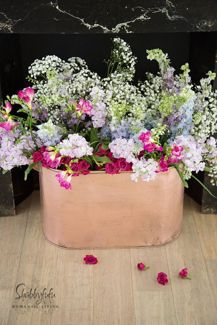 vintage copper bucket flowers