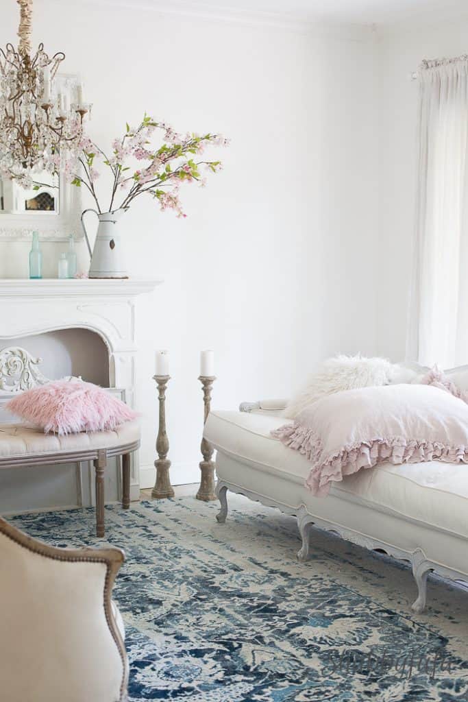 decorate a room with blush pink and navy blue