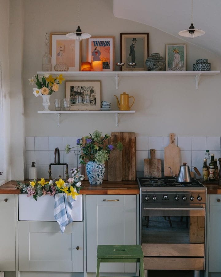 english country cottage styled kitchen featuring a gallery wall