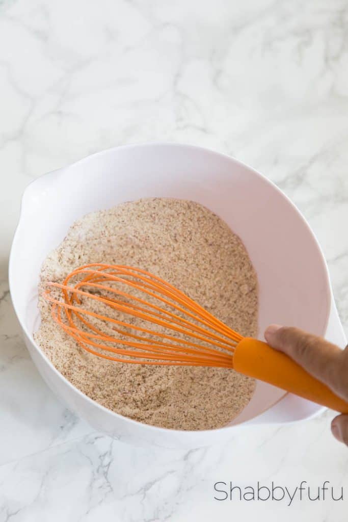 mixing flour with a wisk