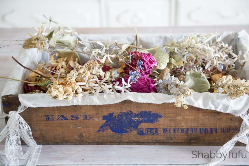 blueberry crate with dried flowers