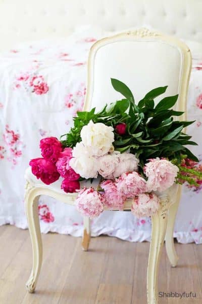 summer flower arrangements peonies on a chair