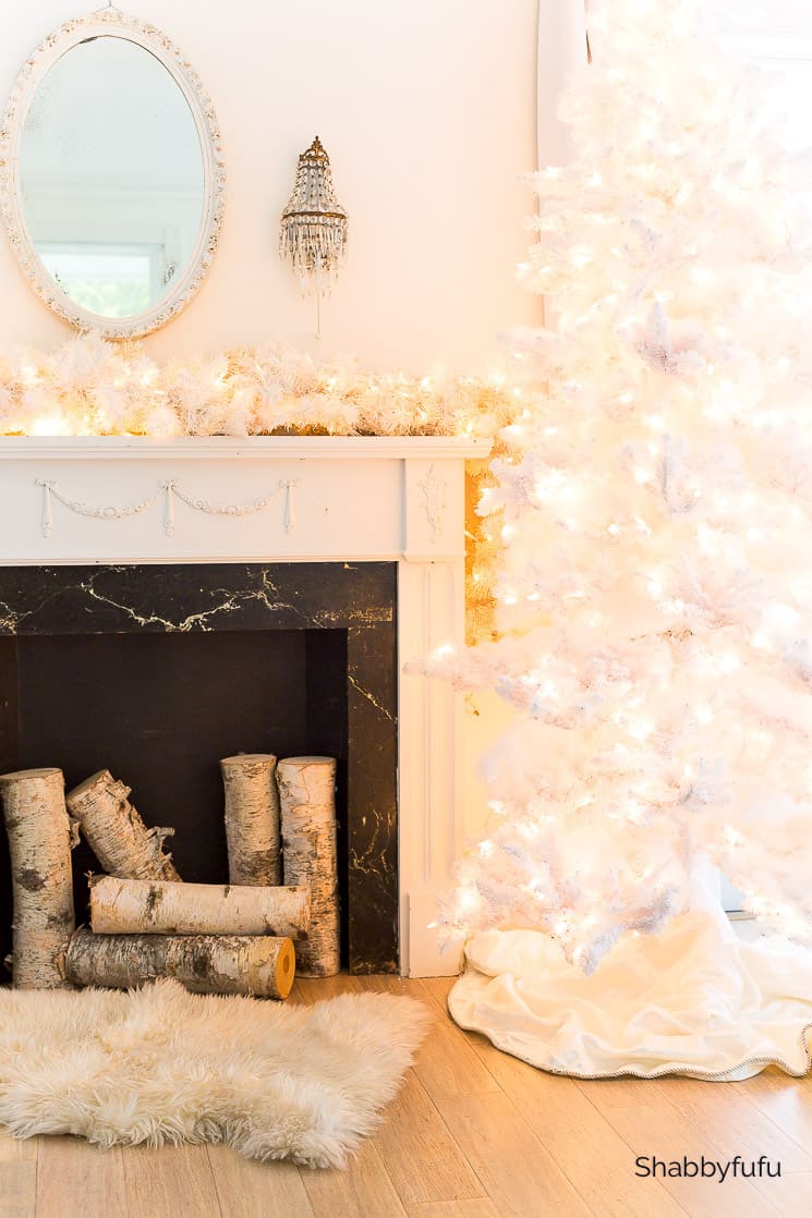 white christmas tree in a french country bedroom