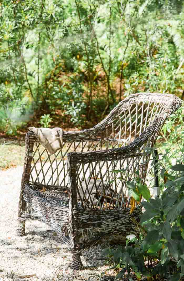 antique wicker chair in the garden
