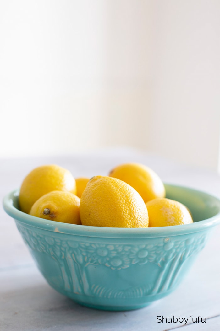bowl of lemons spring home decluttering guide