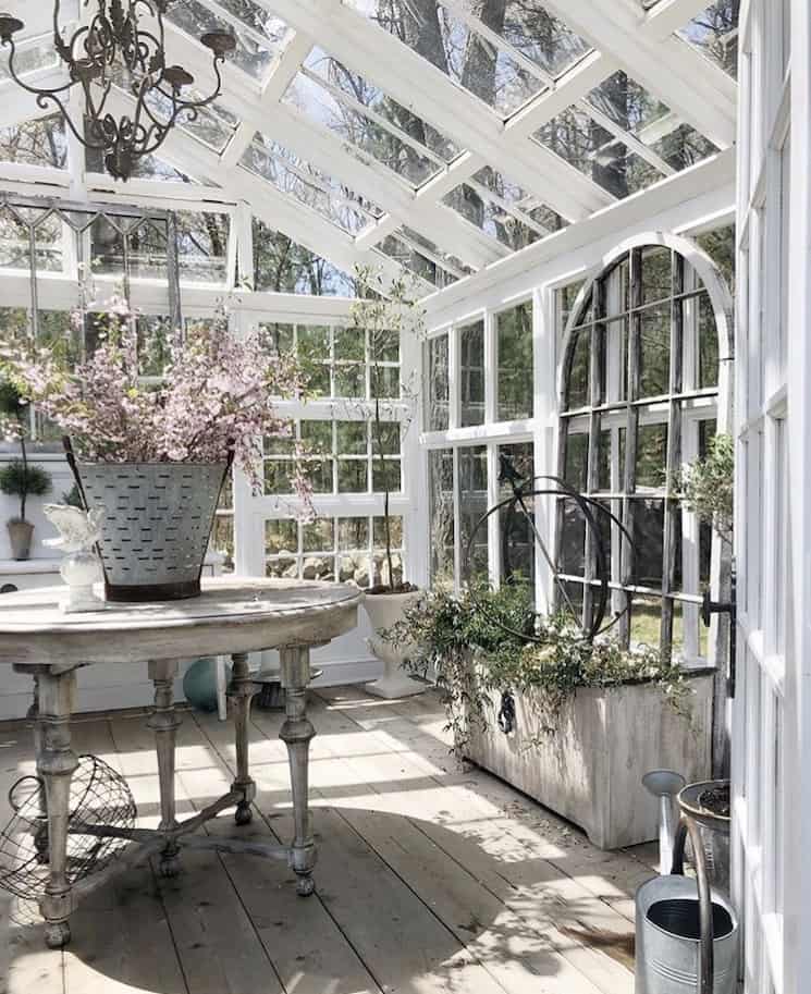 interior of a greenhouse made with windows
