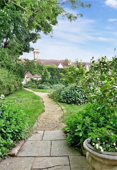 English cottage home garden with walking path