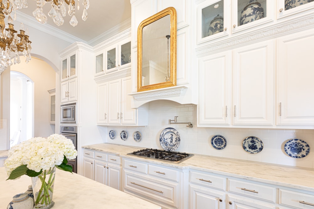 White Kitchen with marble countertops