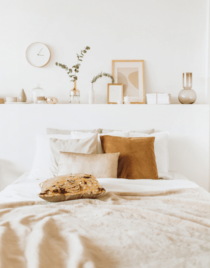 neutral home decorating ideas featuring a bedroom in ivory and off whites color scheme and light brown shades
