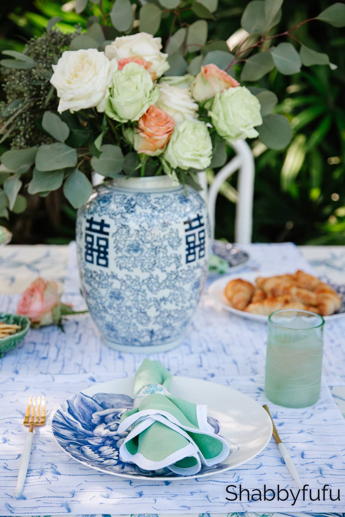 blue and green table setting grandmillennial style