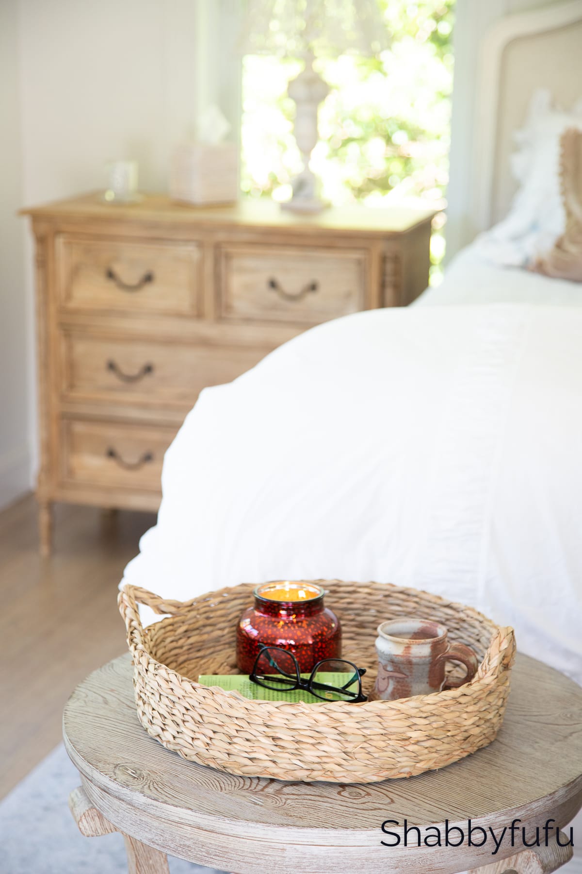 woven tray in side table in cozy bedroom 