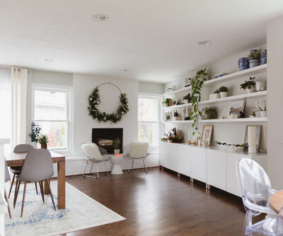 living room in mid-century home, decorated for Christmas, with minimalism inspired decor