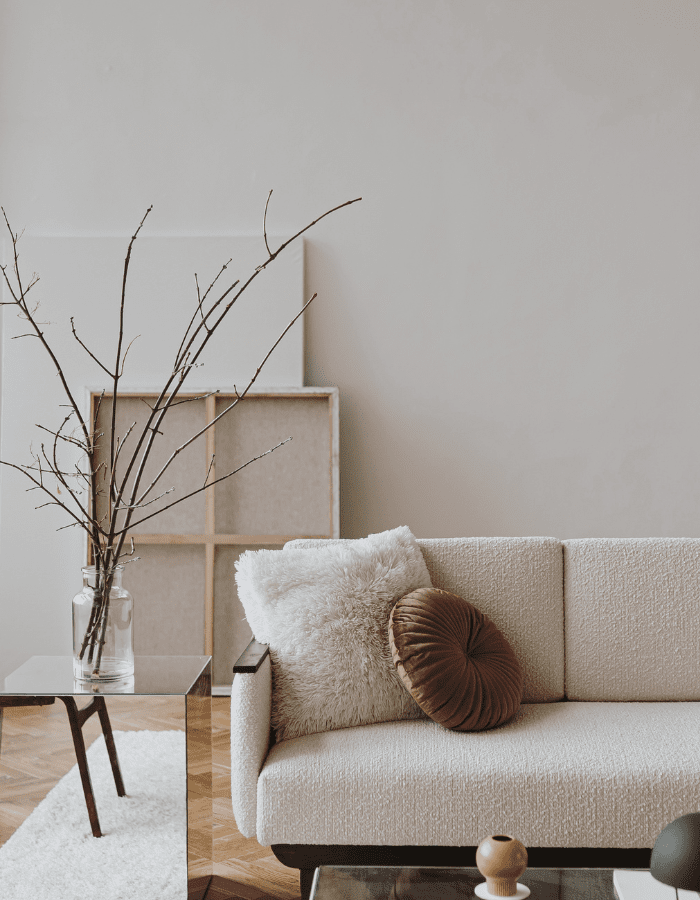 minimal living room featuring warm neutral palette