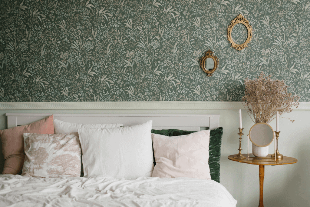 cottage style bedroom with patterned wallpaper and pillows, idea for mixing patterns