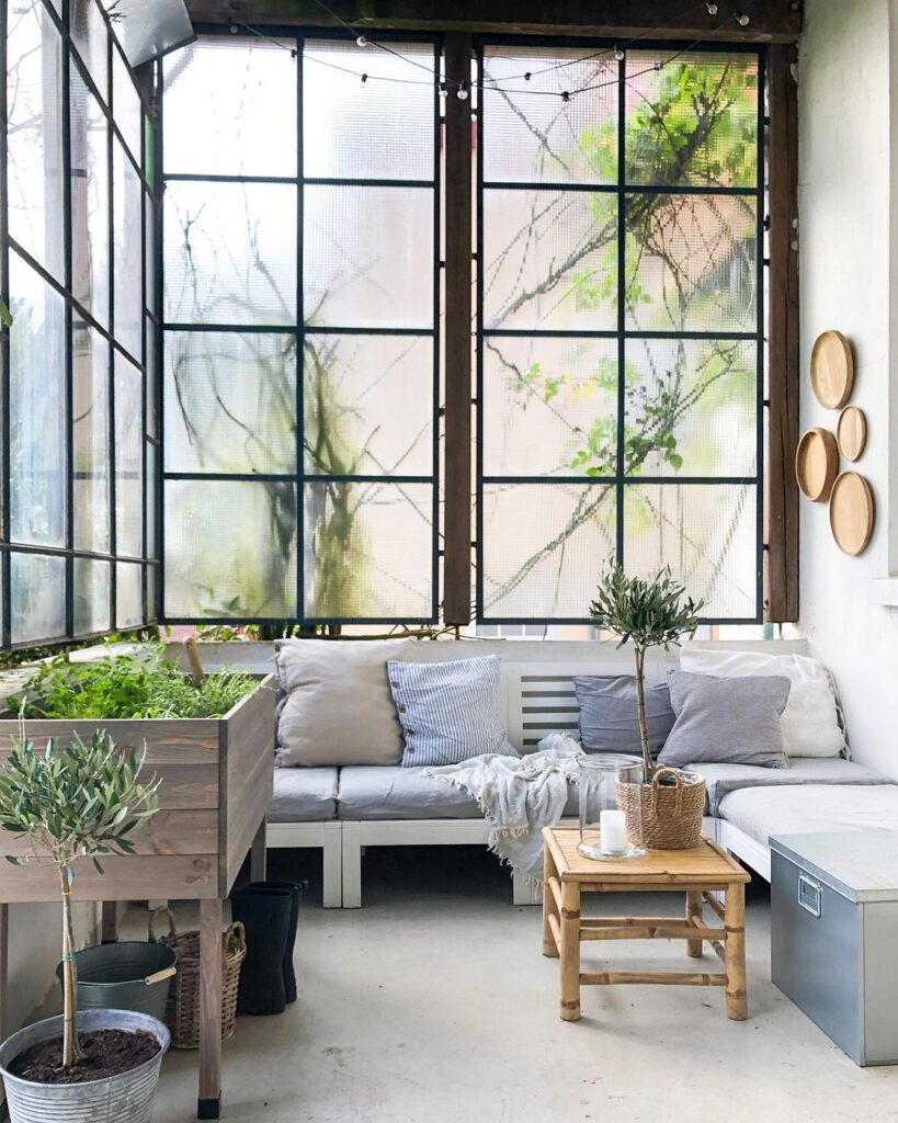industrial style living room with a sectional couch, featuring inspiration on how to arrange throw pillows