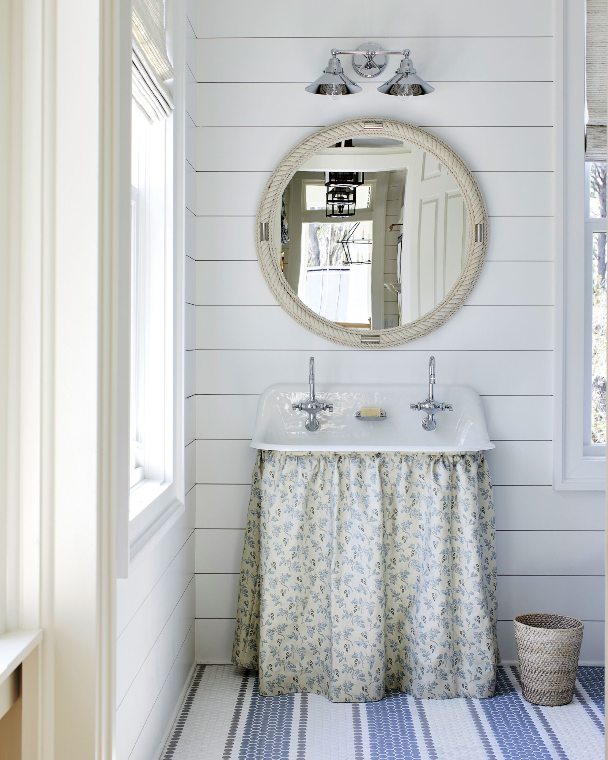 Bathroom idea in coastal inspired home tour with blue and white details