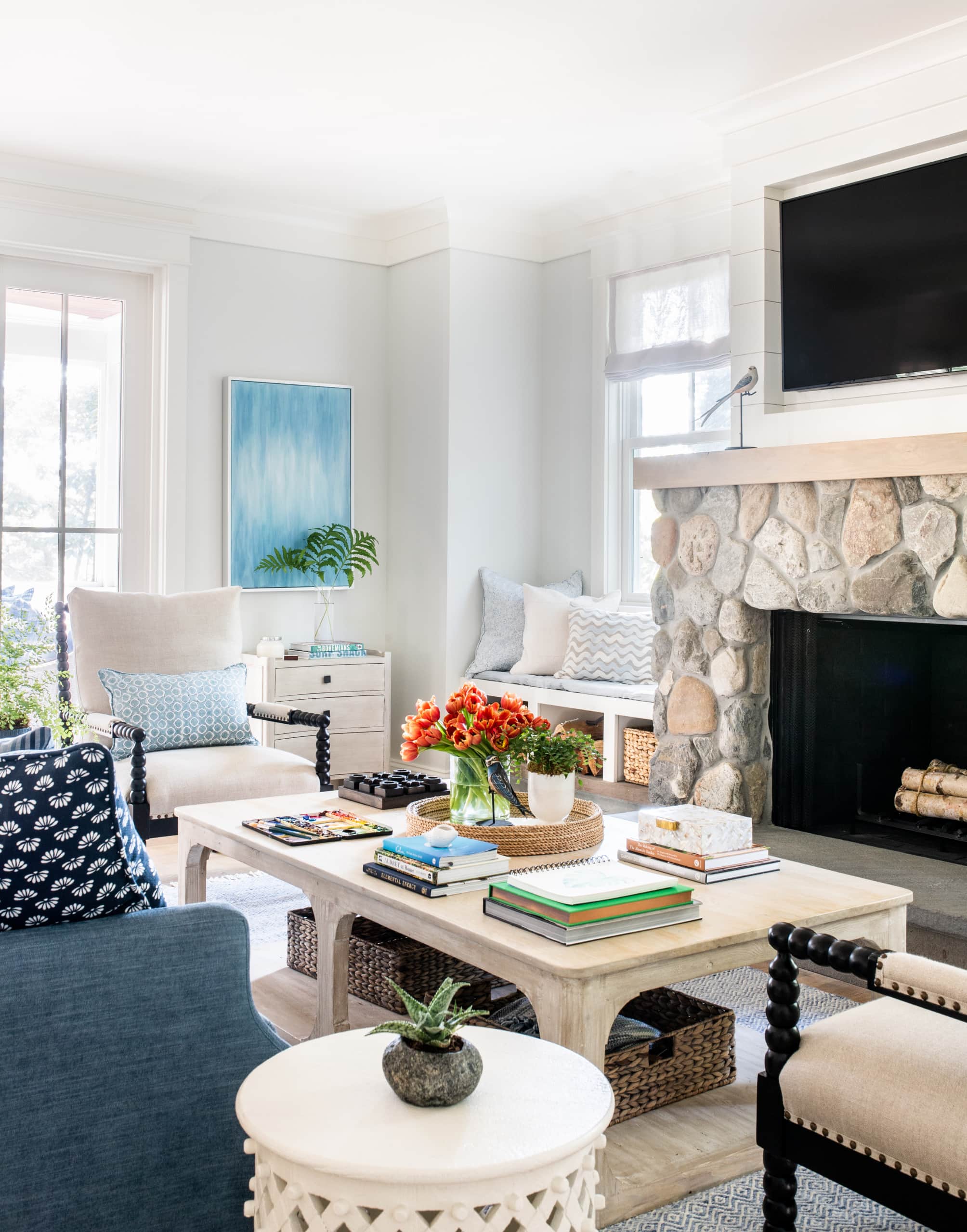 idea of coastal cottage living room featuring fireplace