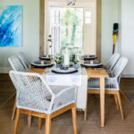 example of a beach style home design dining area