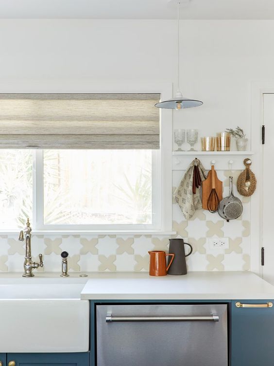 kitchen featuring star and cross tile backsplash kitchen