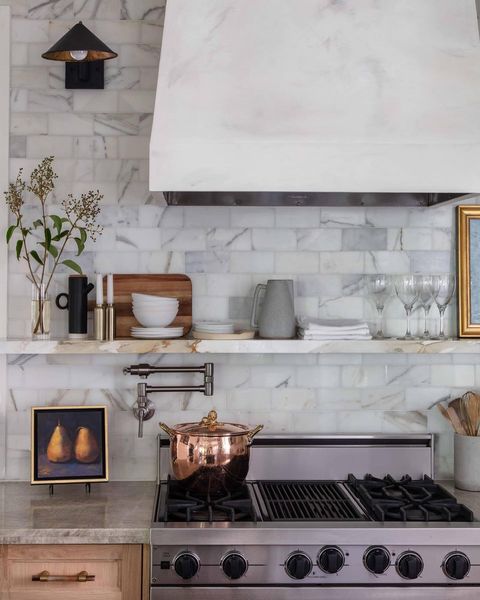 kitchen featuring trending kitchen backsplash made of marble tiles