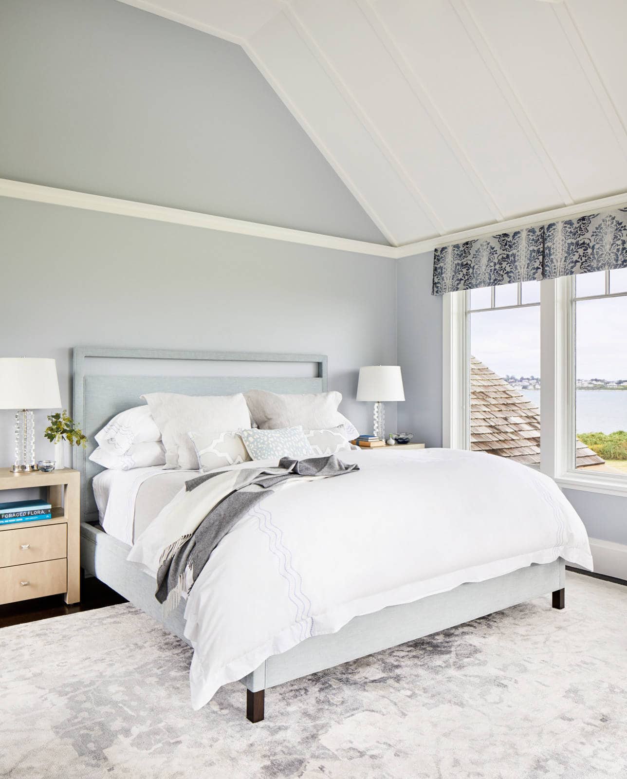 beach style bedroom in blue and white color scheme in coastal style decor