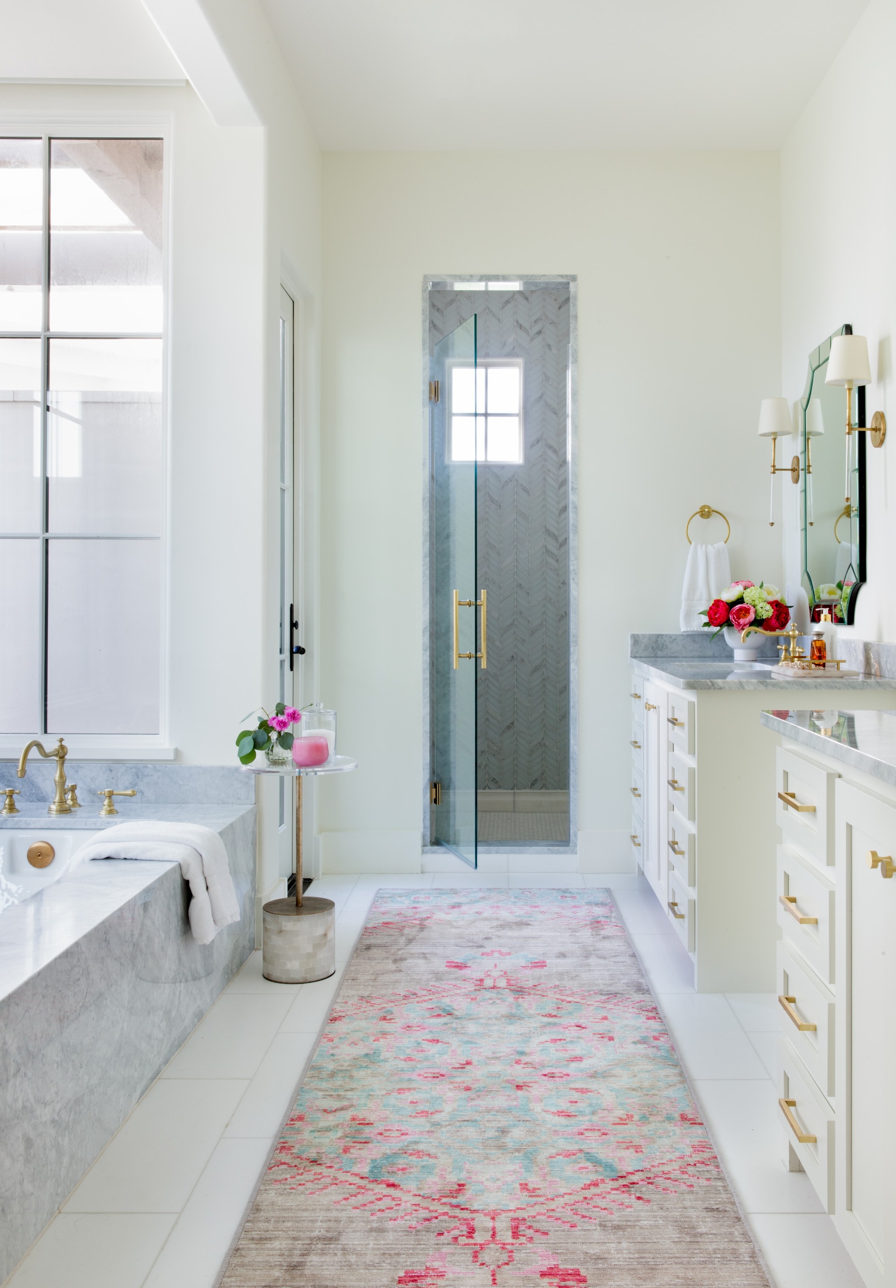 beach house bathroom with pink pops of color