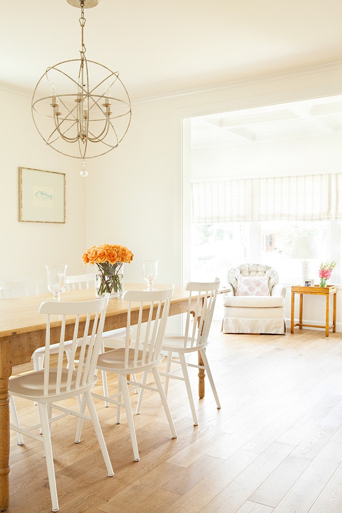 beach coastal cottage featuring dining room showing dining table with a floral arrangement home tour