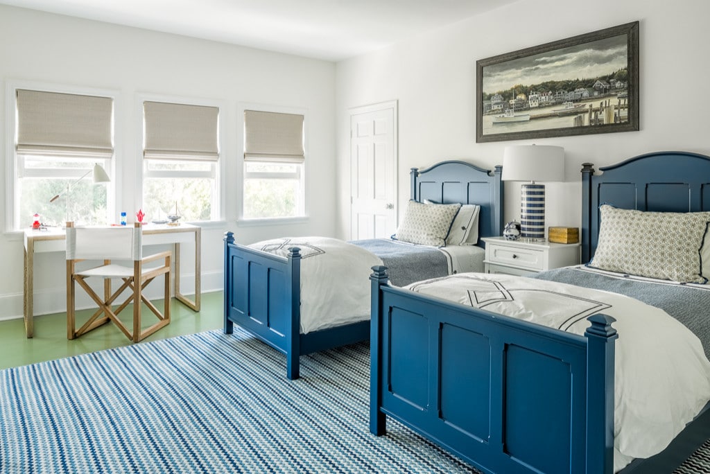 Kids room featuring blue twin beds in home tour