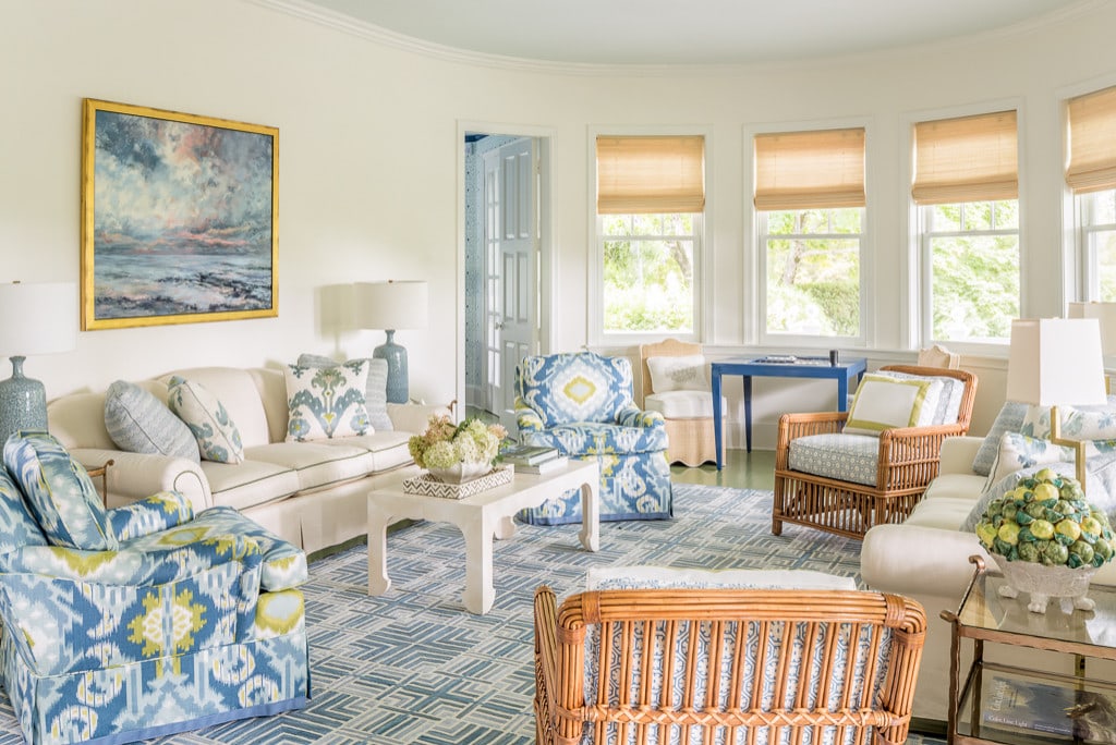 Living room in a beach style home tour featuring a classic color scheme