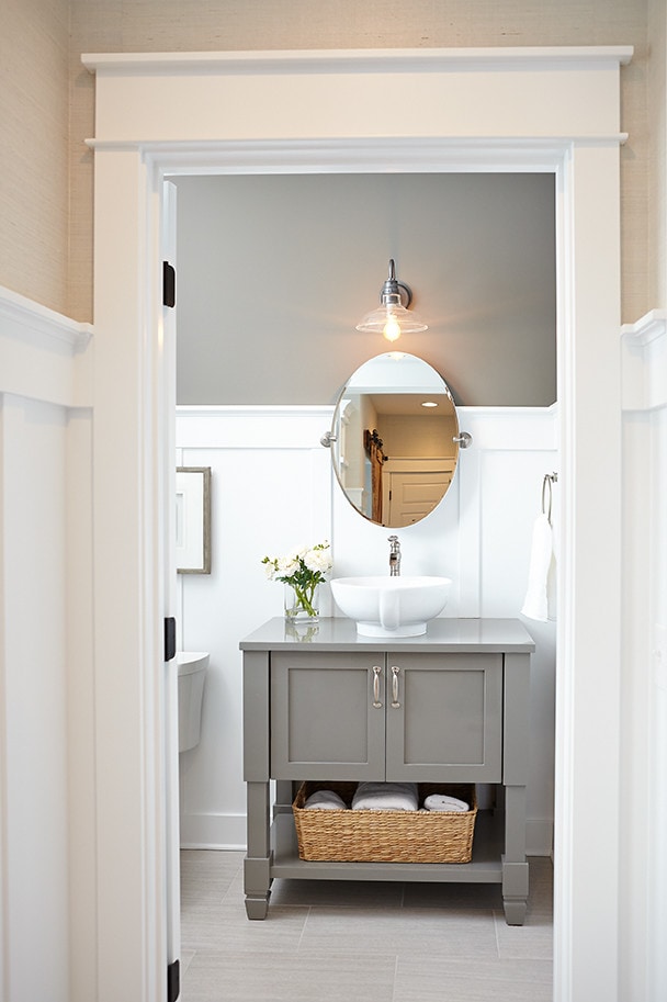 Bathroom featuring traditional style in home tour, with picture framing molding in white