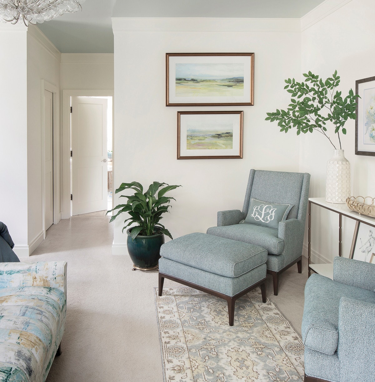 traditional bedroom featured in home tour showcasing a seating area in a bedroom