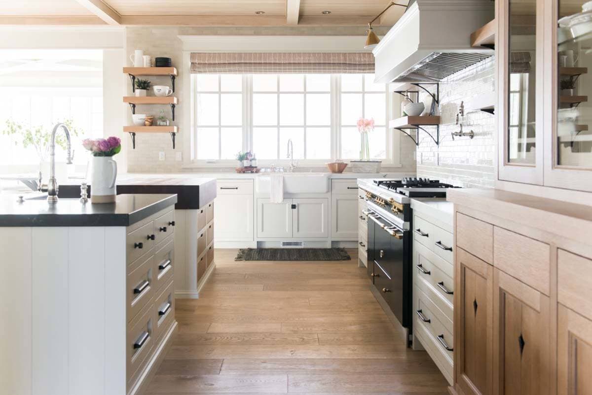 European style home tour kitchen featuring off kitchen island and hardwood floors