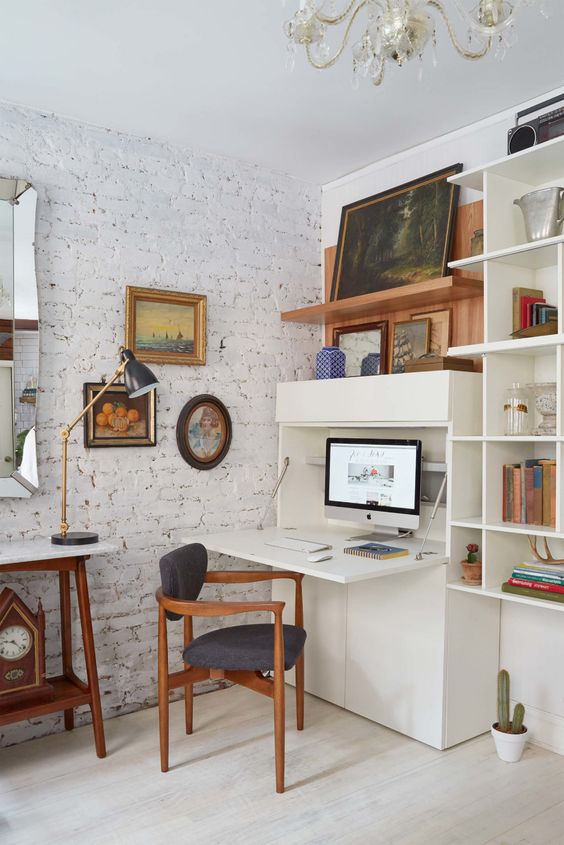 Home office workspace idea featuring a hidden desk