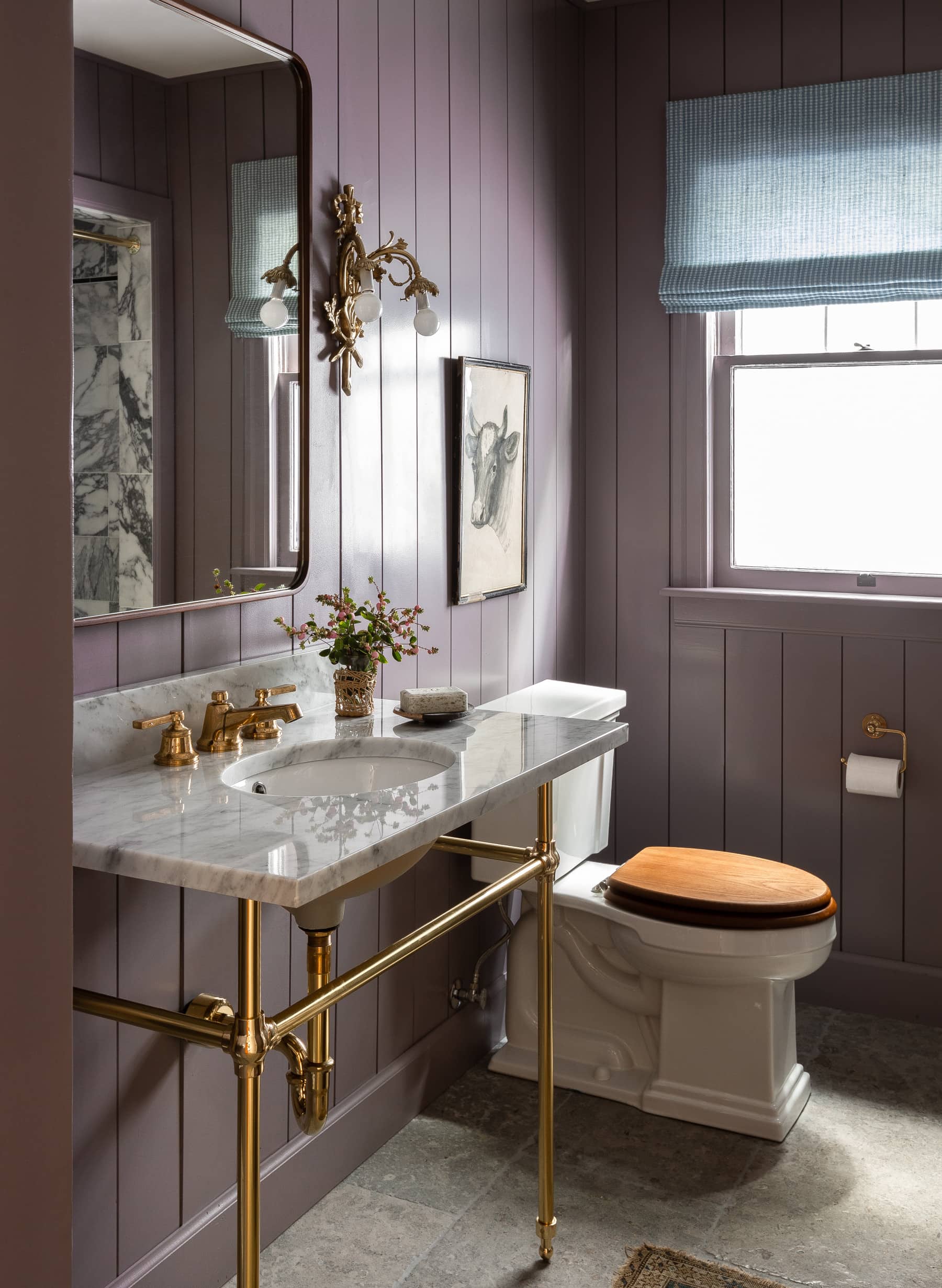 home tour featuring a vintage inspired cottage bathroom showcasing light purple walls