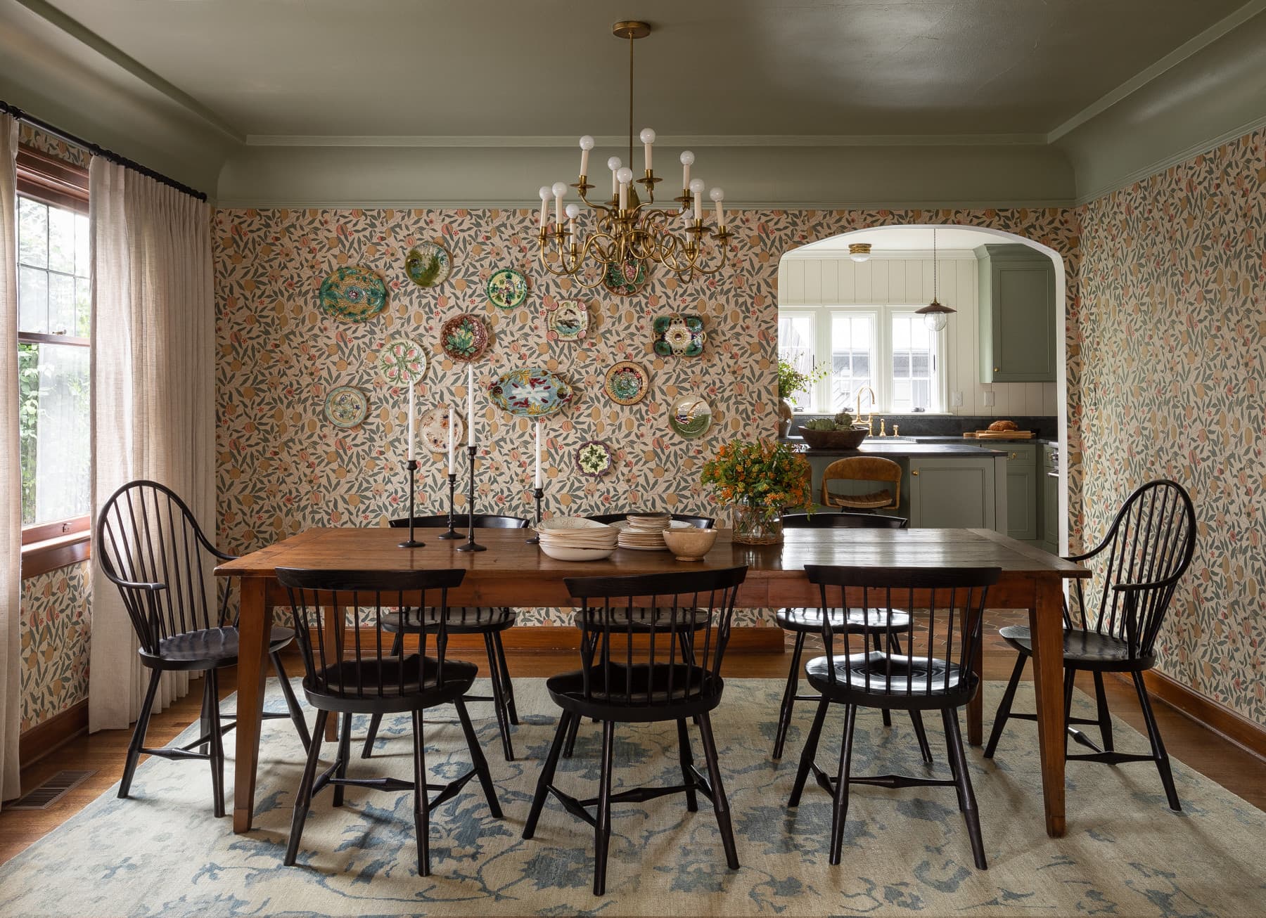 home tour featuring a dining room with showcasing a gallery wall with a vintage cottage decor