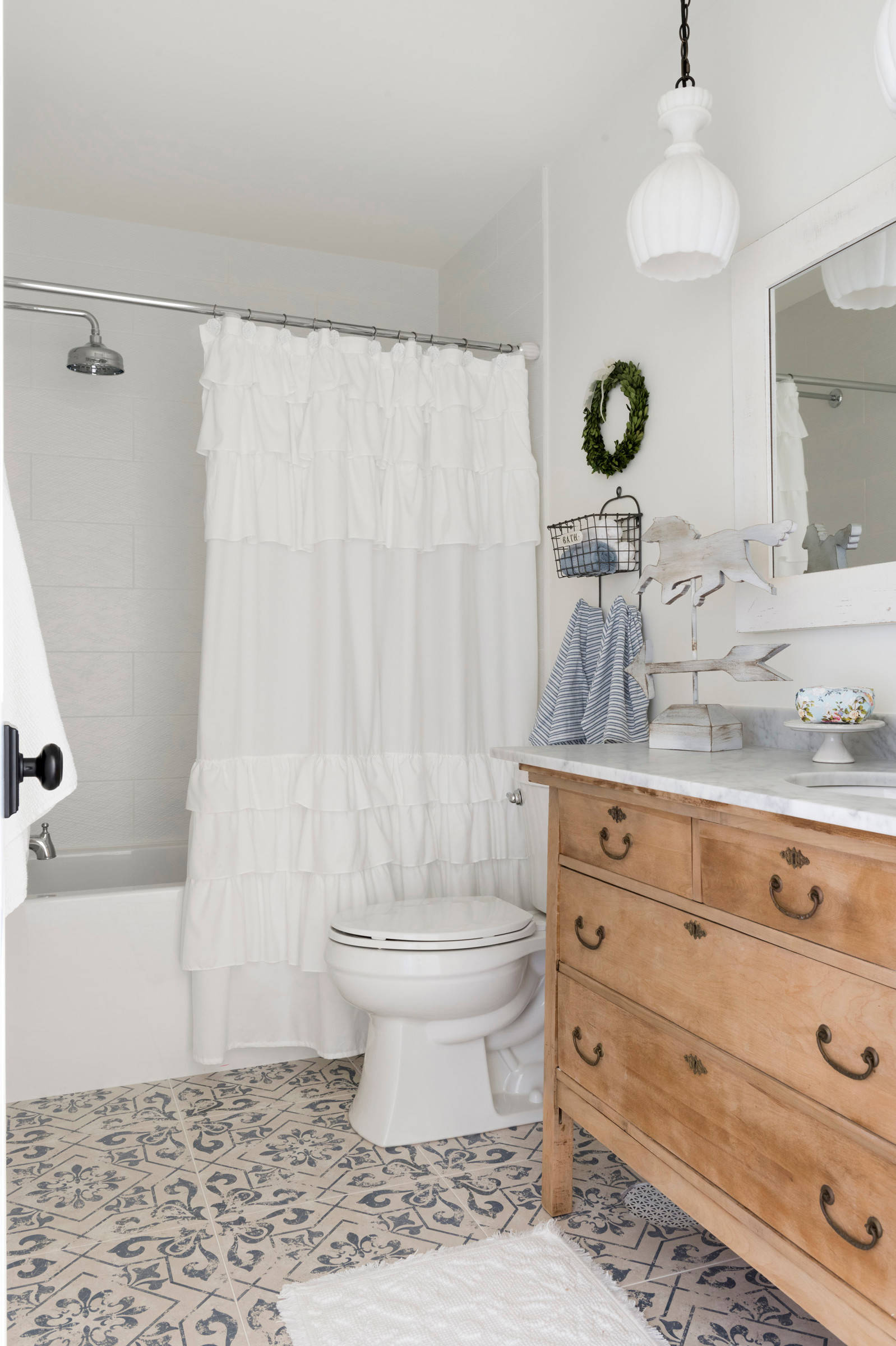 bedroom in a traditional farmhouse style featuring a vintage sink featured in home tour