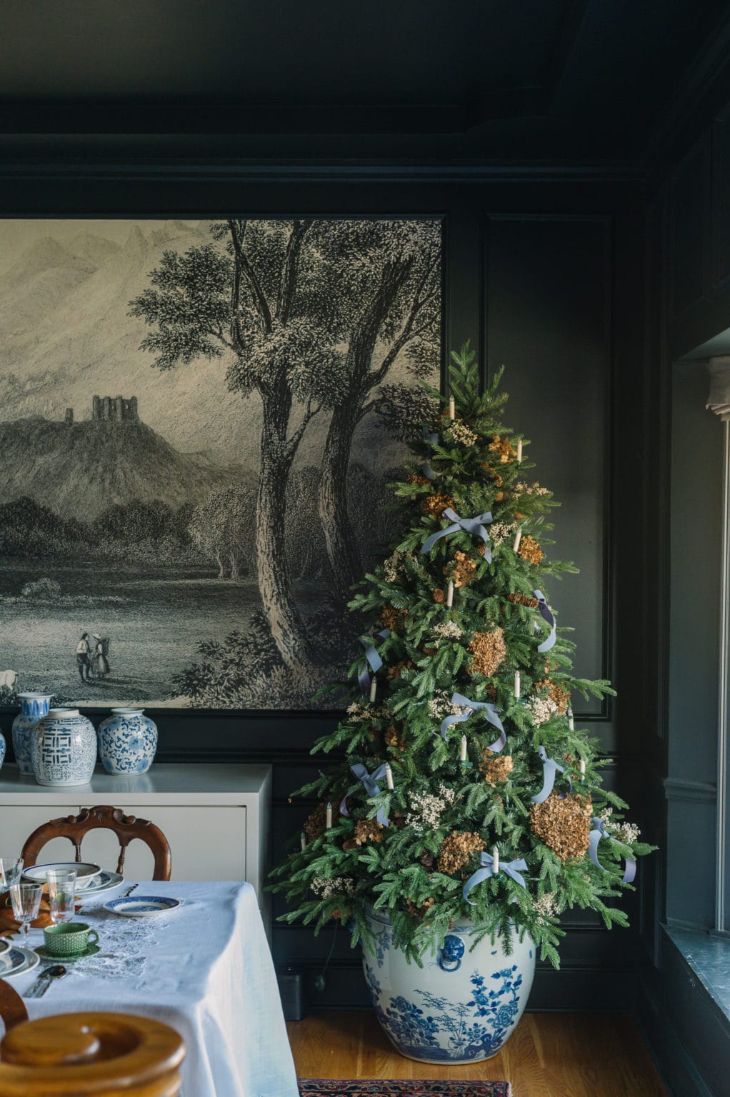 Modern traditional Christmas tree idea featuring chinoiserie ornaments and base