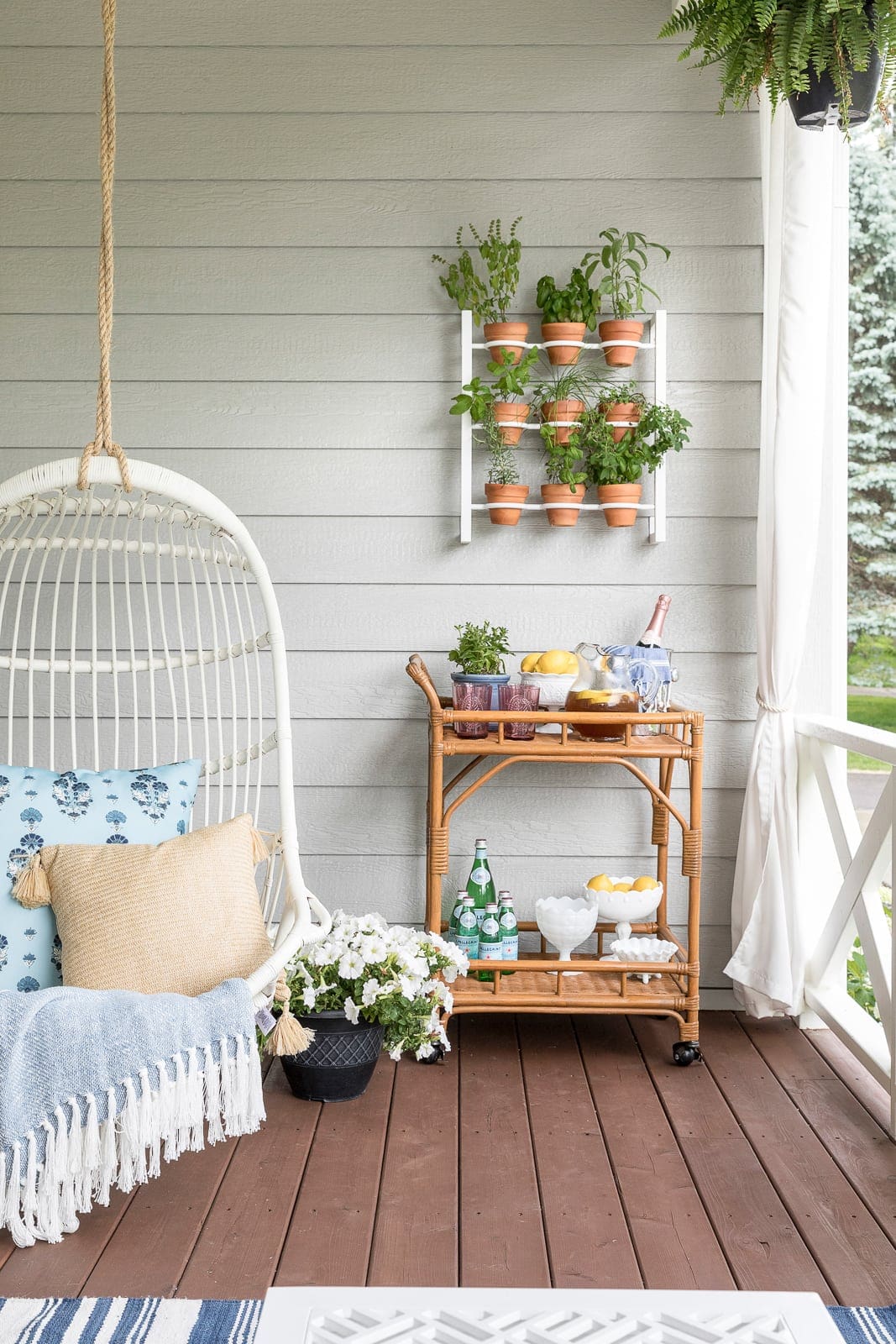 Front porch featuring bamboo bar and swinging chair featured outdoor decorating ideas