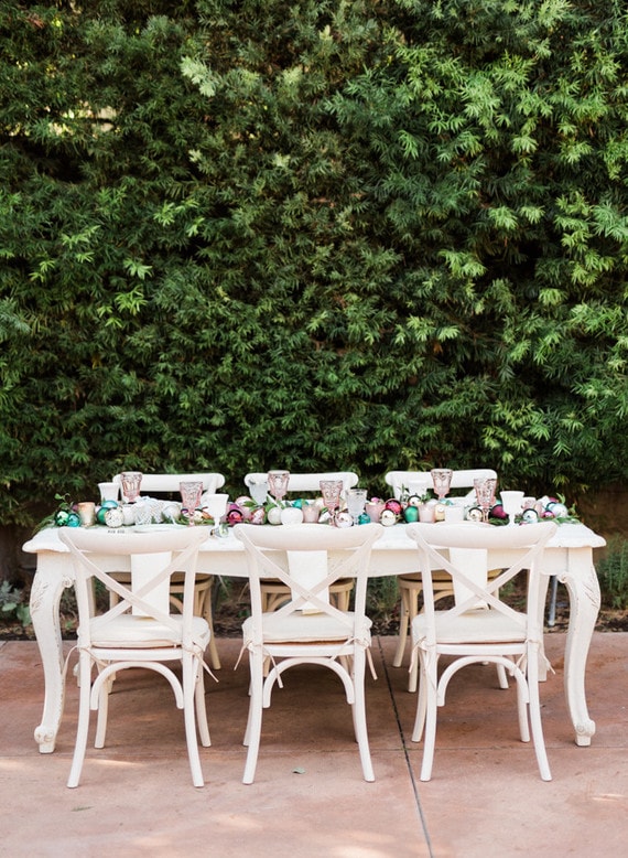 Centerpiece idea featuring outdoor white table