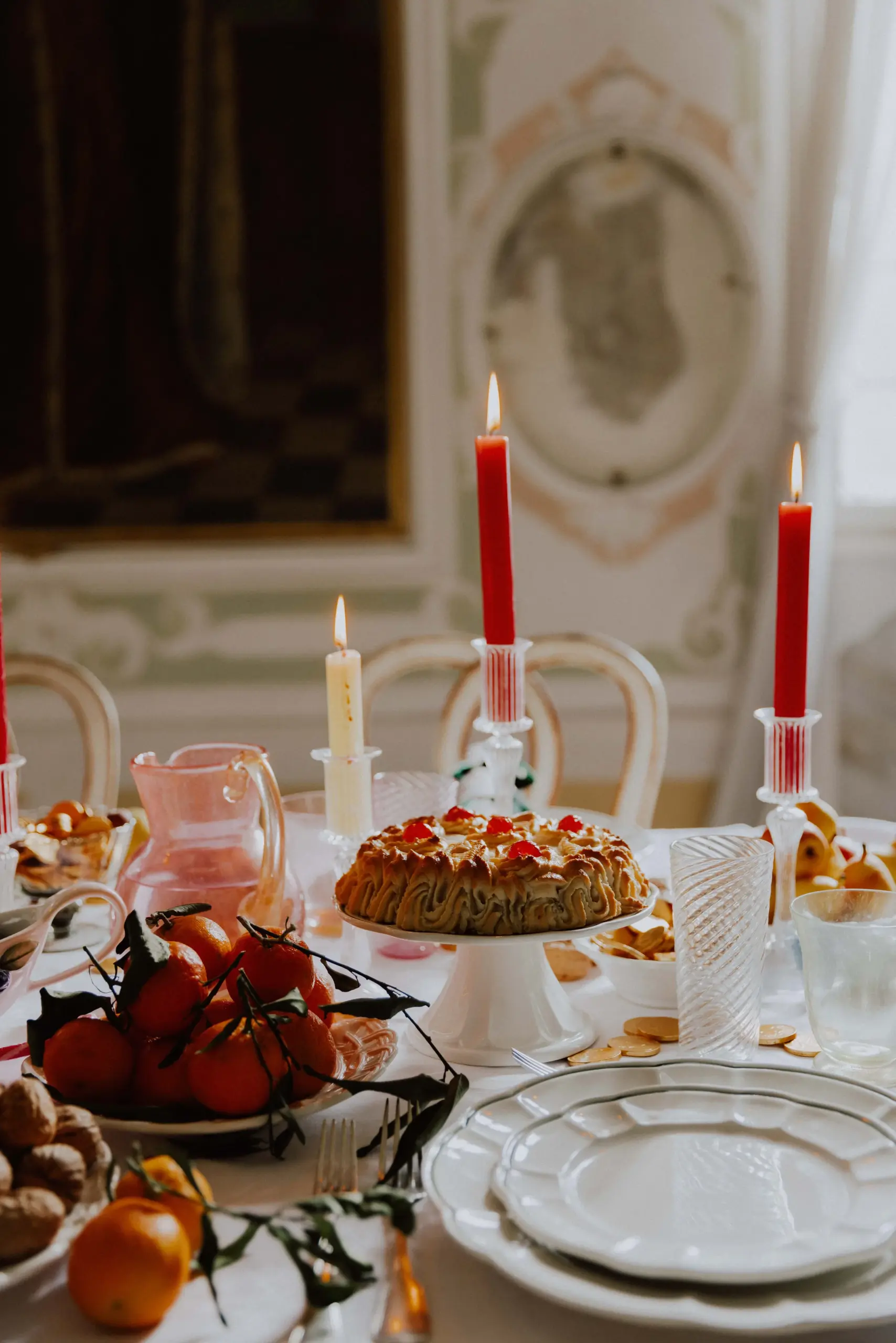 Pink and red candles in traditional european centerpiece idea