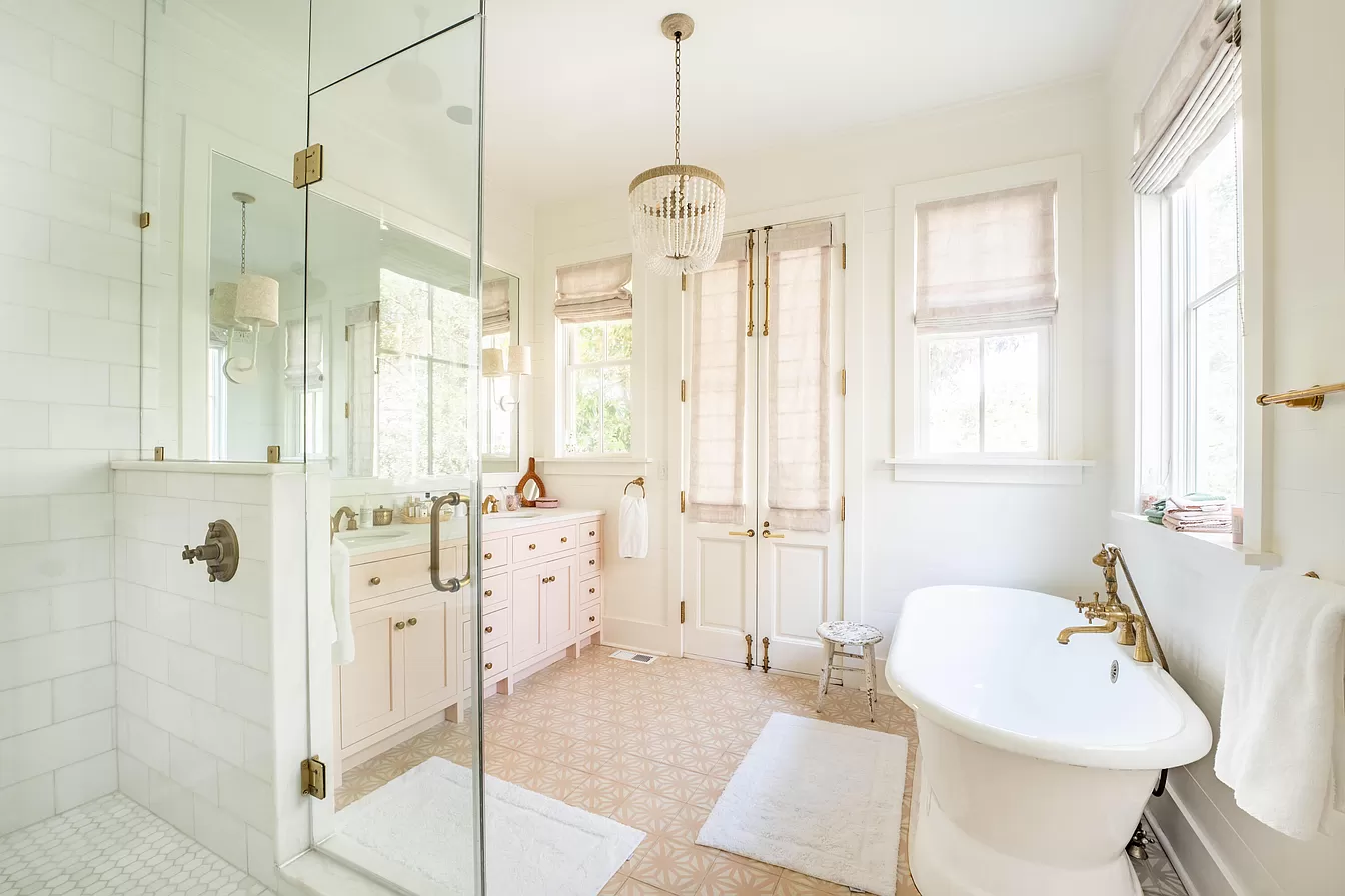 White and pink traditional bathroom featured in Julia Berolzheimer home tour